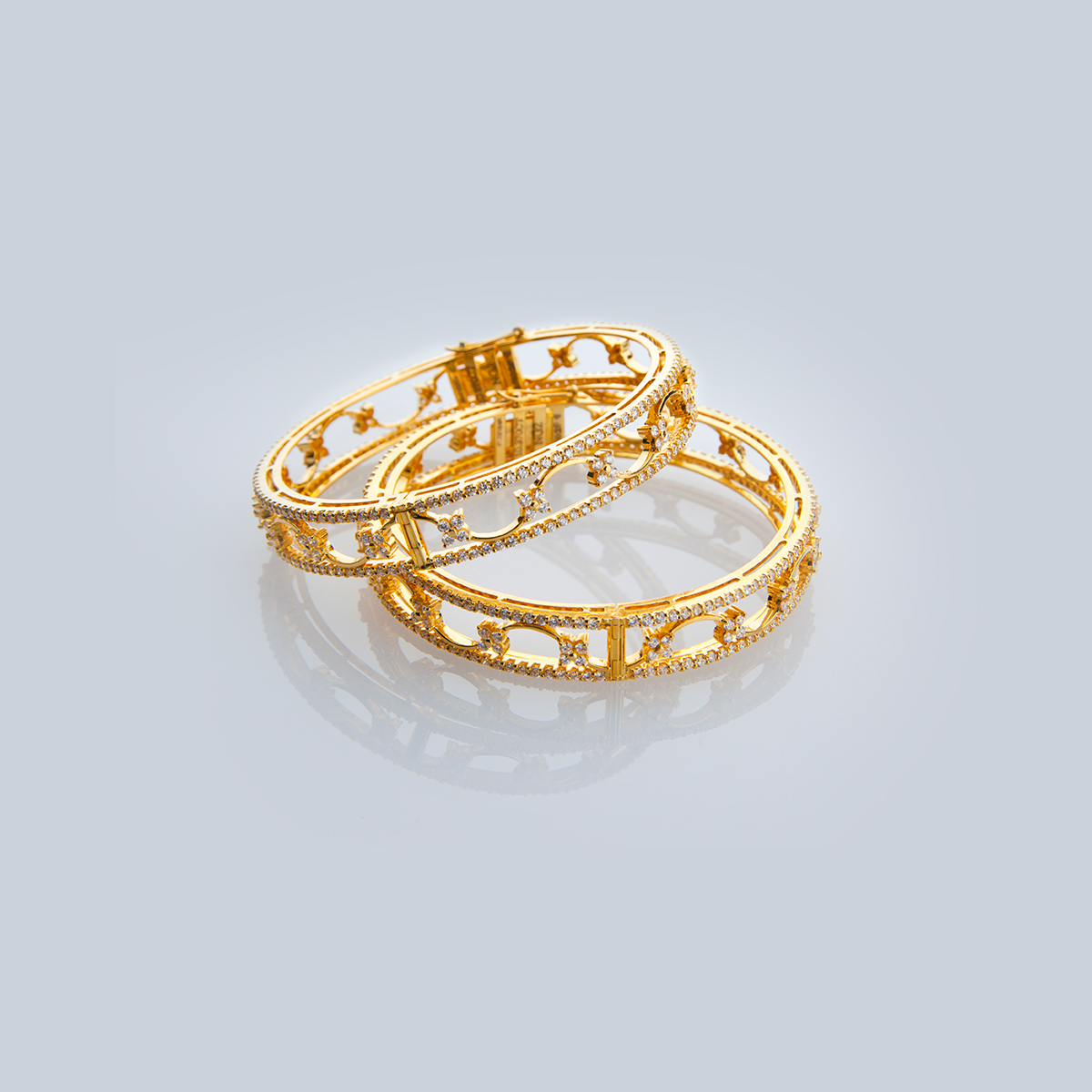 Edge Twisted Gold Bangle  Giriraj Jewellers  Gold bangles for women Gold  necklace designs 22k gold bangles