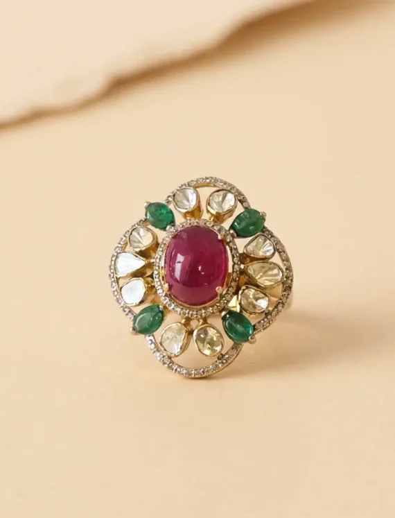 Gold ring with a large pink oval ruby centerpiece