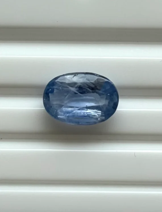 Gemstone identification report for a blue sapphire showing color