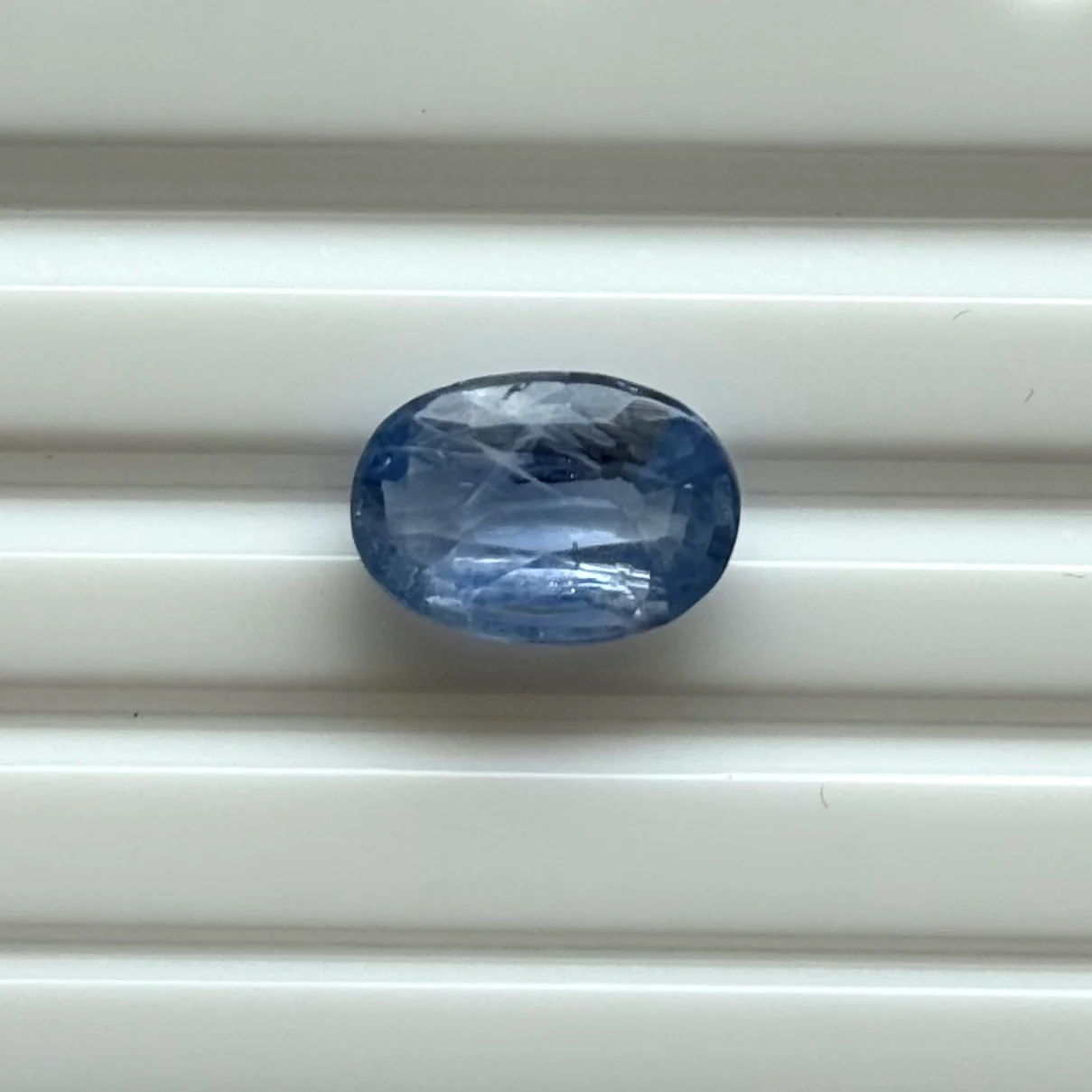 Gemstone identification report for a blue sapphire showing color
