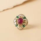 Gold ring with a large pink oval ruby centerpiece